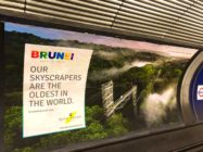 An advert for Royal Brunei Airlines at a London tube station