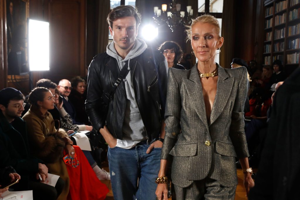 Canadian singer Celine Dion and Spanish dancer Pepe Munoz arrive for the 2019 Spring-Summer Haute Couture collection fashion show by RVDK Ronald van der Kemp in Paris, on January 23, 2019.