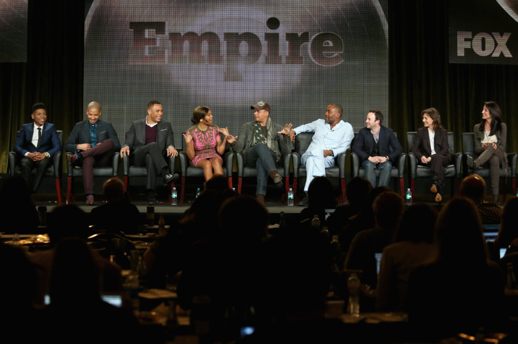 Empire actors Bryshere Gray, Jussie Smollett; Trai Byers, Taraji P. Henson, Terrence Howard, creators Lee Daniels and Danny Strong and executive producers Ilene Chaiken and Francie Calfo speak onstage during the 'Empire' panel discussion in 2015.