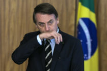 Brazilian President Jair Bolsonaro gestures during a ceremony of presentation of new diplomats' credentials at Planalto Palace in Brasilia, on March 8, 2019.