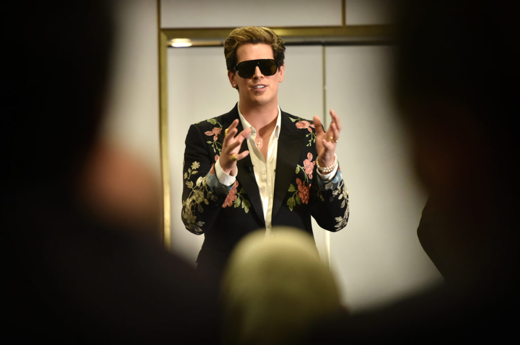 Right-wing British provocateur Milo Yiannopoulos answers questions during a speech at Parliament House in Canberra on December 5, 2017