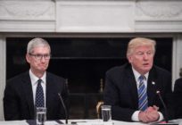 Apple CEO Tim Cook (L) listens to US President Donald Trump during an American Technology Council roundtable at the White House in Washington, DC, on June 19, 2017.