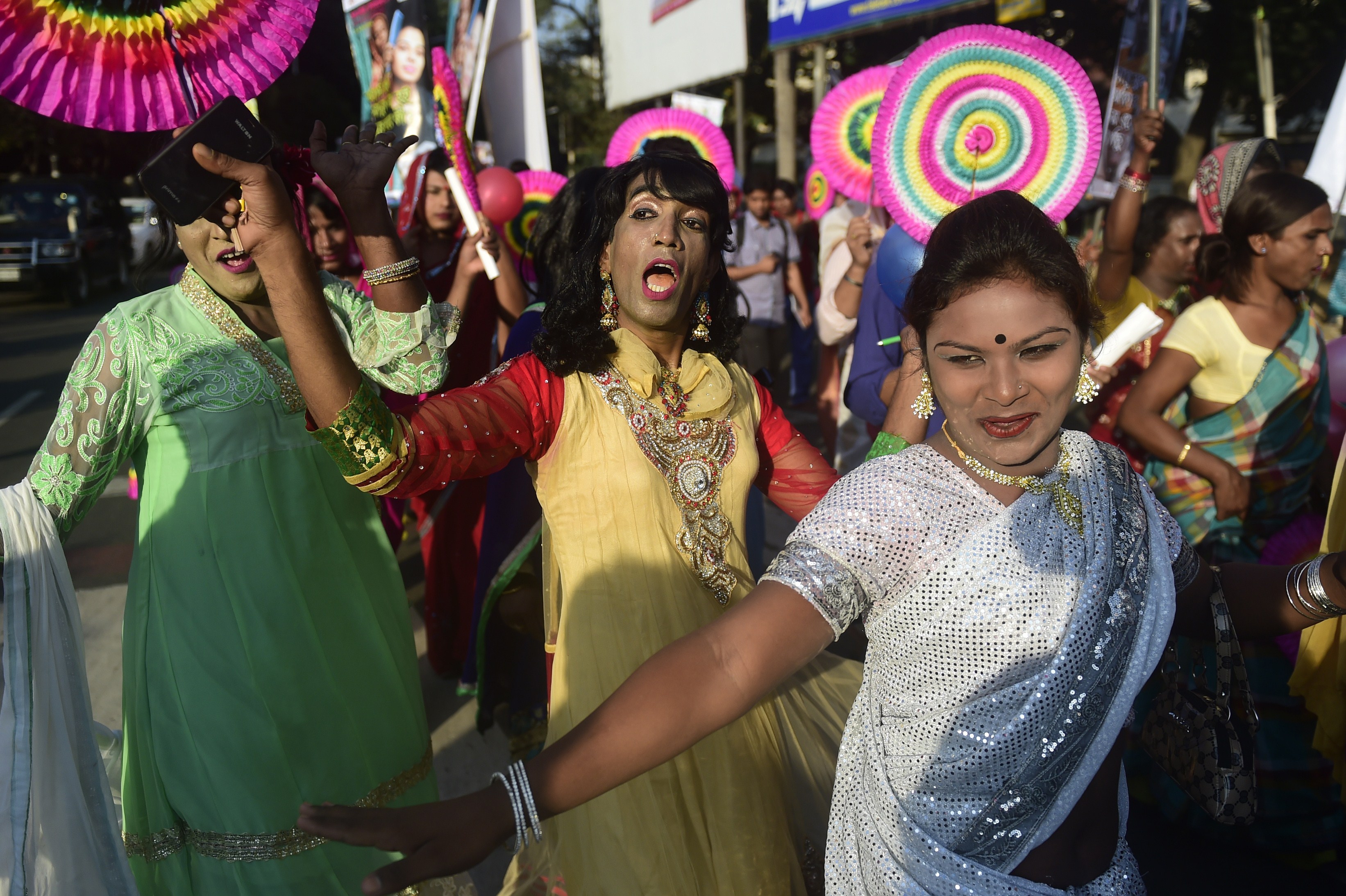 Hijras dance in the street