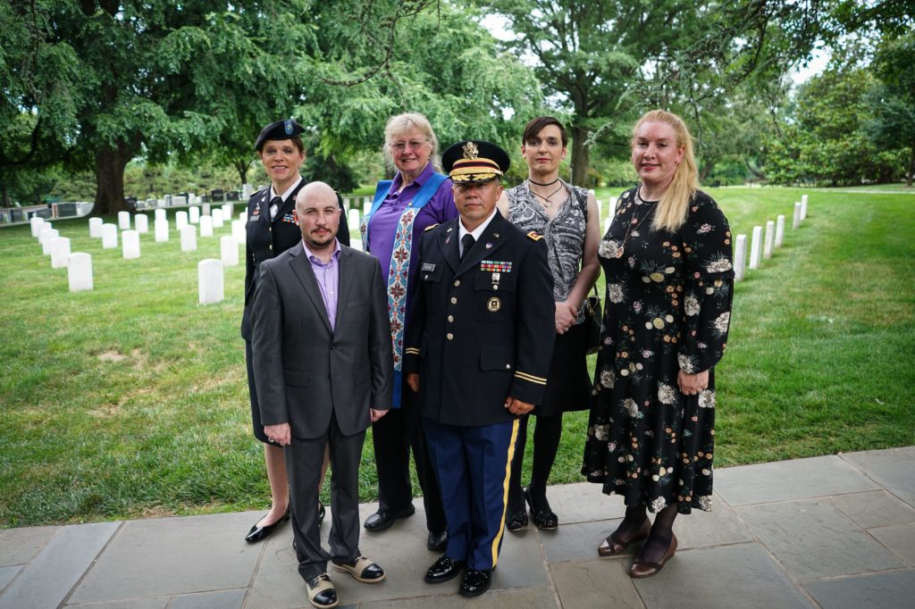 Transgender troops pose for a photo in Arlington National Cemetery, from left: retired Army lieutenant colonel Ann Murdoch, Transgender American Veterans Association Vice President Gene Silvestri, Yvonne Cook-Riley, retired Army major and Transgender American Veterans Association President Evan Young, petty officer first class Alice Ashton and retired Air Force major Nella Ludlow