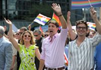 Prime Minister Justin Trudeau, who has approved the design of the new $1 coin, marches at pride.