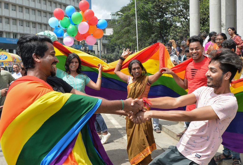 Indian members and supporters of the LGBT community celebrate the Supreme Court decision to strike down a colonial-era ban on gay sex, in Bangalore on September 6, 2018. (MANJUNATH KIRAN/AFP/Getty Images)