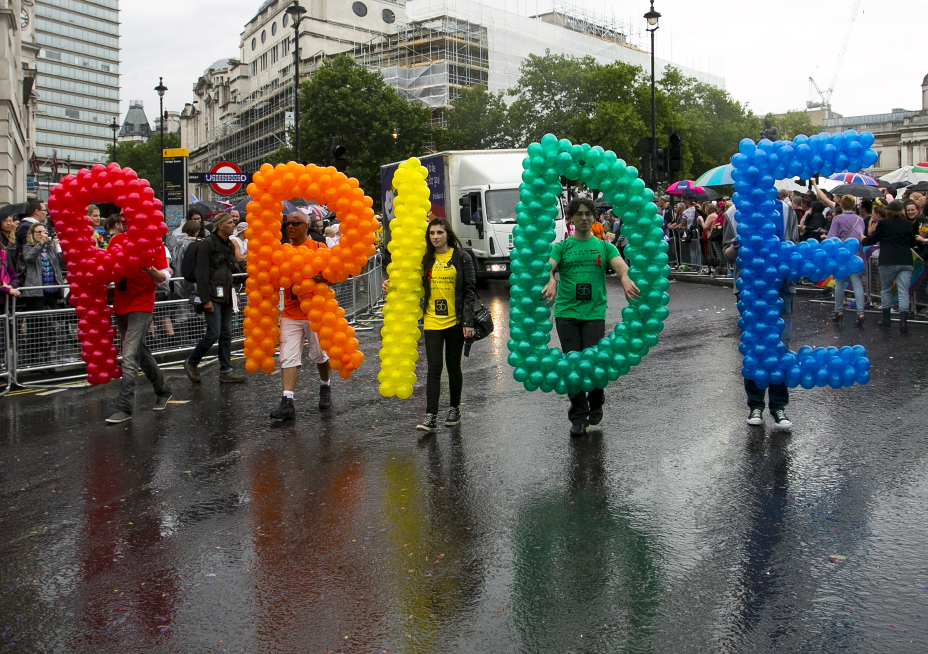 People take part in the Pride in London march in 2014, which celebrates those identifying as part of the LGBT acronym and their allies.