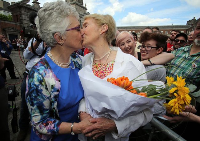 Irish Senator Katherine Zappone kisses her partner Ann Louise Gilligan following the same-sex marriage referendum in Ireland
