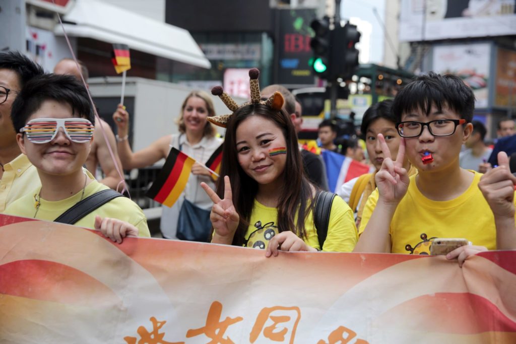 People take part in the Lesbian, Gay, Bi-sexual and Transgender (LGBT) parade in Hong Kong on November 6, 2015. Hong Kong's streets were coloured by rainbow flags as protesters marched in the city's annual gay pride parade to call for equality and same-sex marriage. AFP PHOTO / ISAAC LAWRENCE (Photo credit should read Isaac Lawrence/AFP/Getty Images)