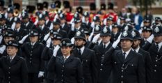 Met Police recruits take part in a parade at the end of their training