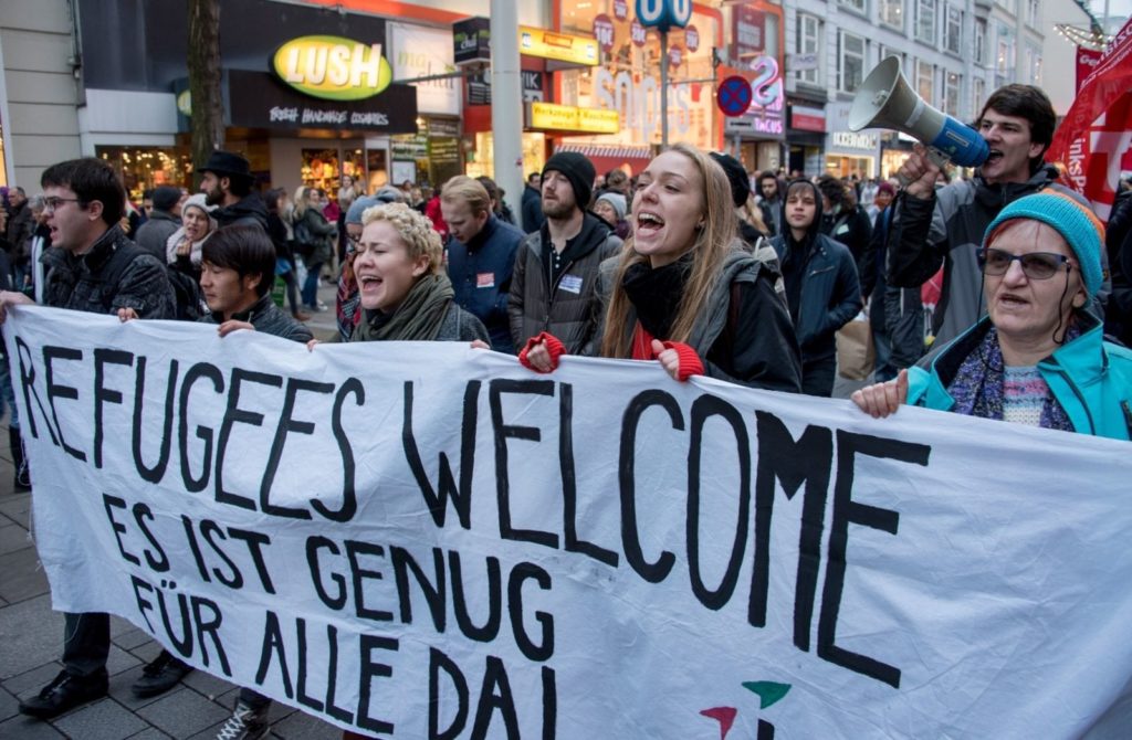 Austrian citizens and asylum seekers march during a pro-refugee protest called "Let them stay" in Vienna, Austria on November 26, 2016. Austria will hold the postponed second round of the presidential elections on December 4, 2016. / AFP / JOE KLAMAR (Photo credit should read JOE KLAMAR/AFP/Getty Images)