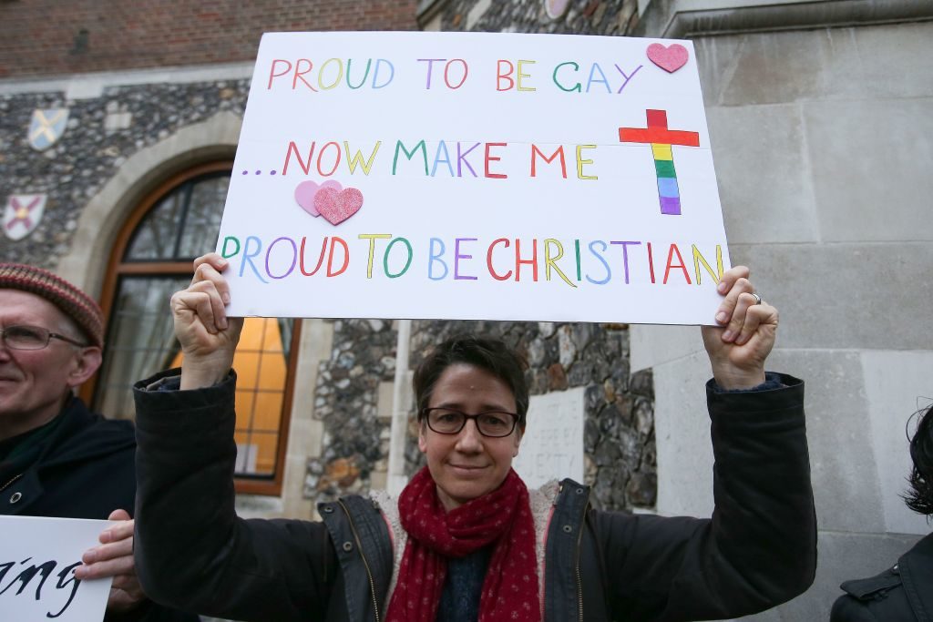a protester outside the church of england general synod