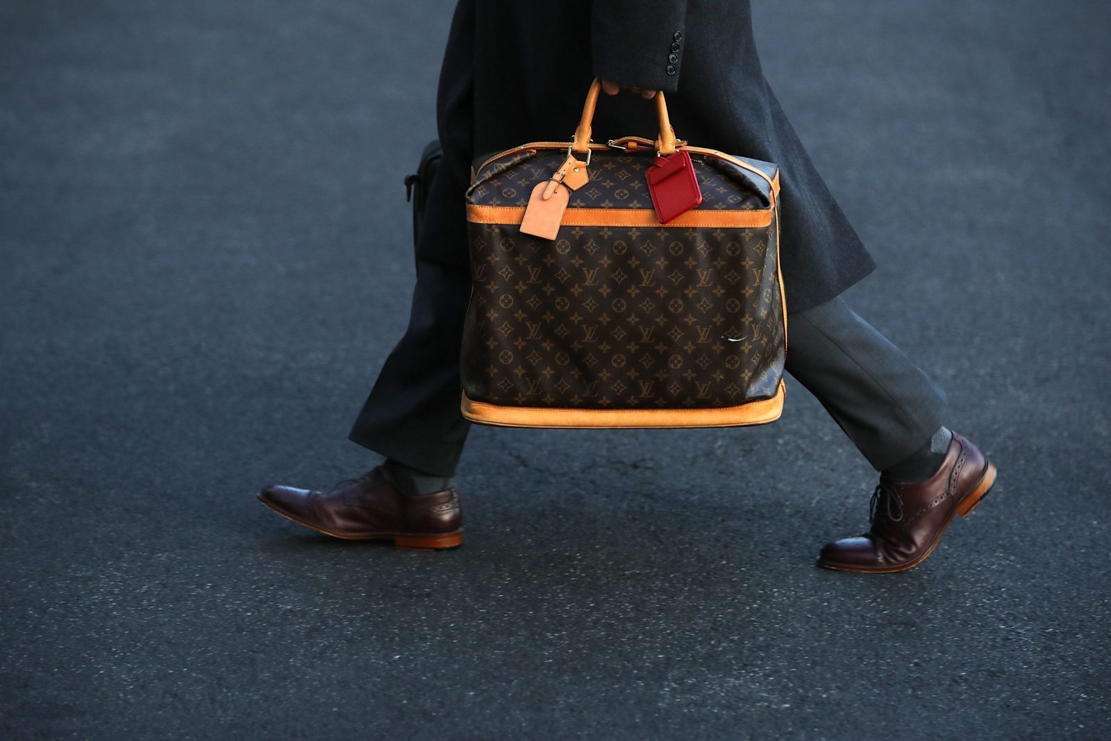 Gay man risks being shot by armed robber to save his Louis Vuitton bag