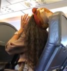 Woman yells homophobic and racist slurs at plane passenger
