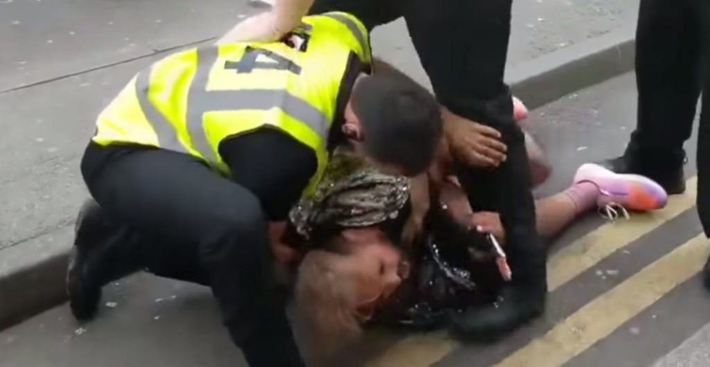 Ferhan Khan being tackled by Birmingham Pride security staff