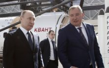 Russian President Vladimir Putin talks with Russian Deputy Prime Minister and Head of ROSCOSMOS Dmitry Rogozin