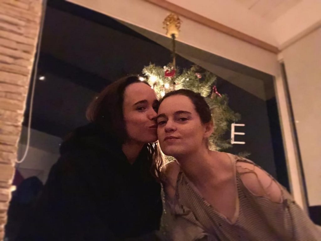Ellen Page kisses her wife Emma Portner