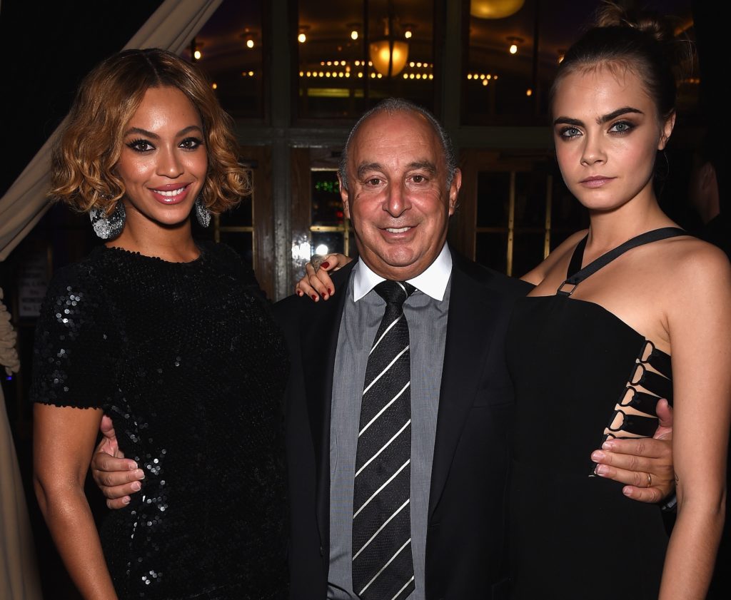 Beyoncé, Sir Philip Green and Cara Delevingne pictured together at a Topshop event
