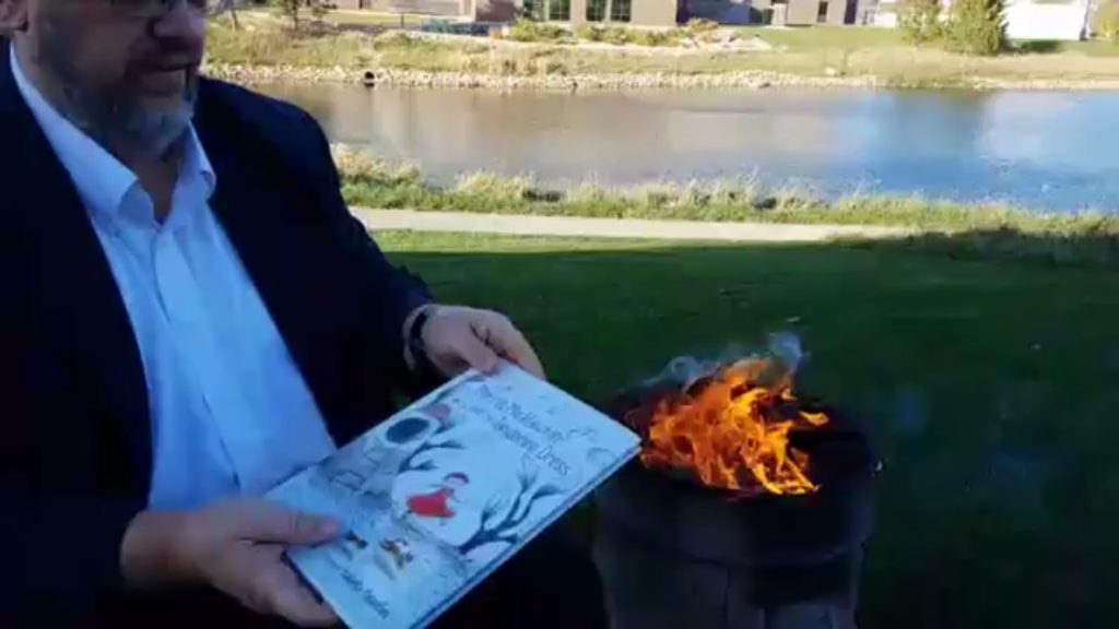 Paul Dorr filmed himself burning the library books