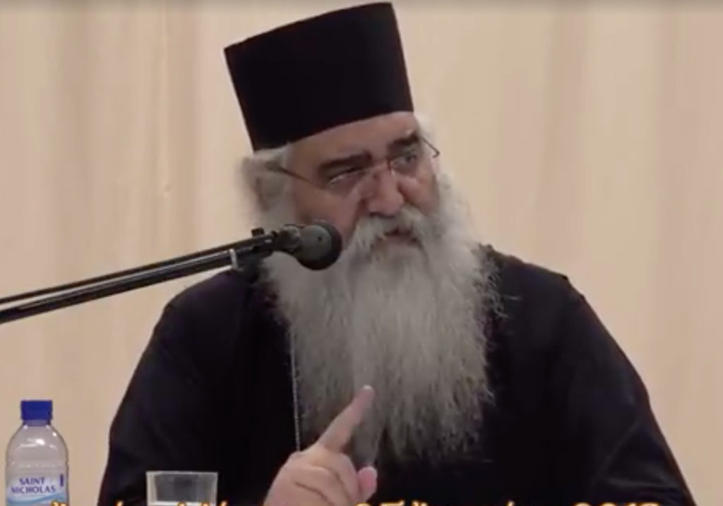 Bishop Neophytos of Morphou speaking into a microphone