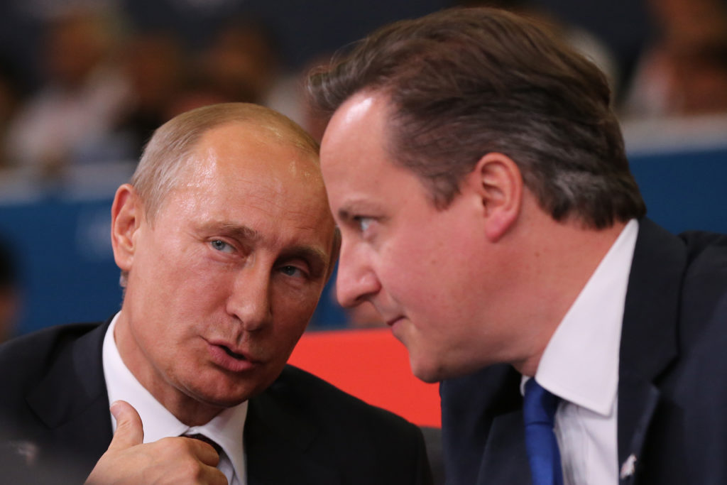 Russian President Vladimir Putin with British Prime Minister David Cameron