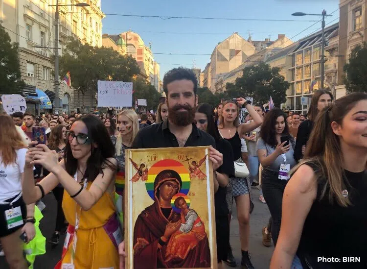 Nik Jovičić-Sas carrying a homemade Virgin Mary icon with a rainbow halo at Belgrade Pride 2019, Serbia. (Nik Jovičić-Sas)