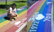 A rainbow walk with 'Jesus loves you' spray painted all over it