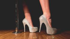A woman wearing silver heels