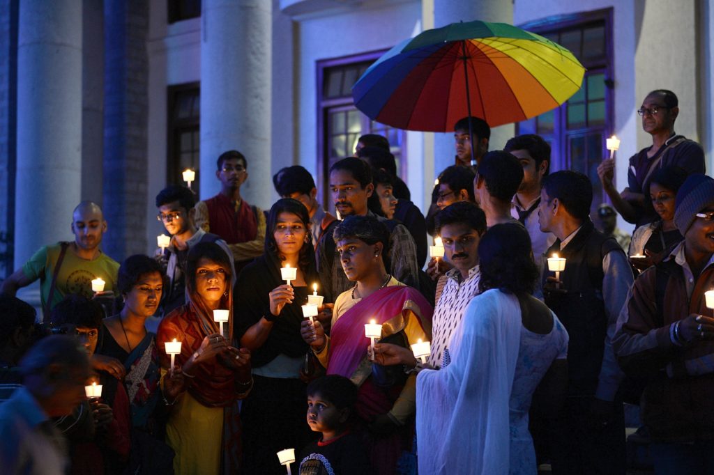 Transgender activists and their supporters take part in a candle light vigil held as part of Transgender Day of Remembrance. (MANJUNATH KIRAN/AFP via Getty Images)