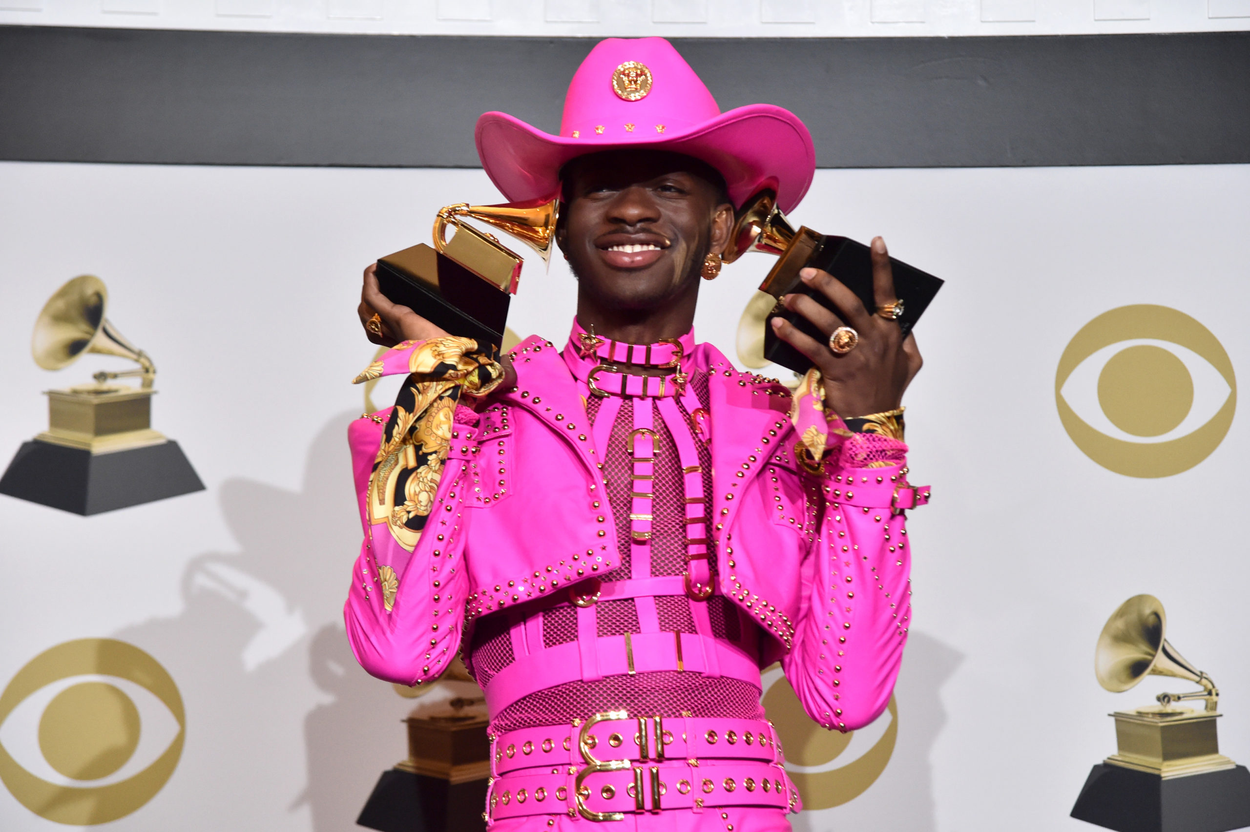 Lil Nas X Wins Big At The Grammys In All Pink Versace Dominatrix Outfit