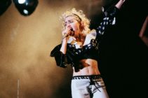 Madonna performs on stage on her Blonde Ambition tour at Wembley Stadium, on July 20th, 1990 in London, England. (Pete Still/Redferns)