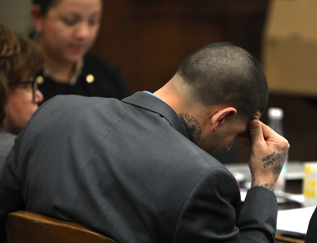 Former New England Patriots tight end Aaron Hernandez listens while attorneys make oral arguments. (Pat Greenhouse/The Boston Globe via Getty Images)