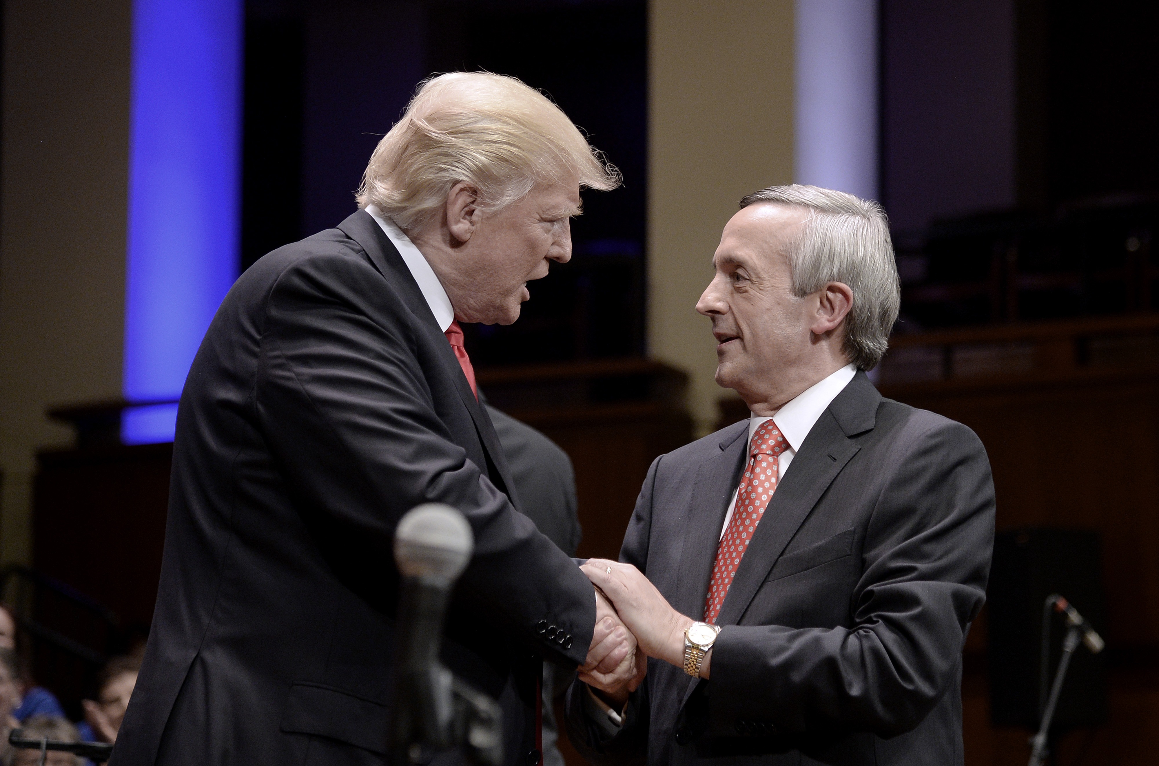 US president Donald Trump is greeting by pastor Robert Jeffress 