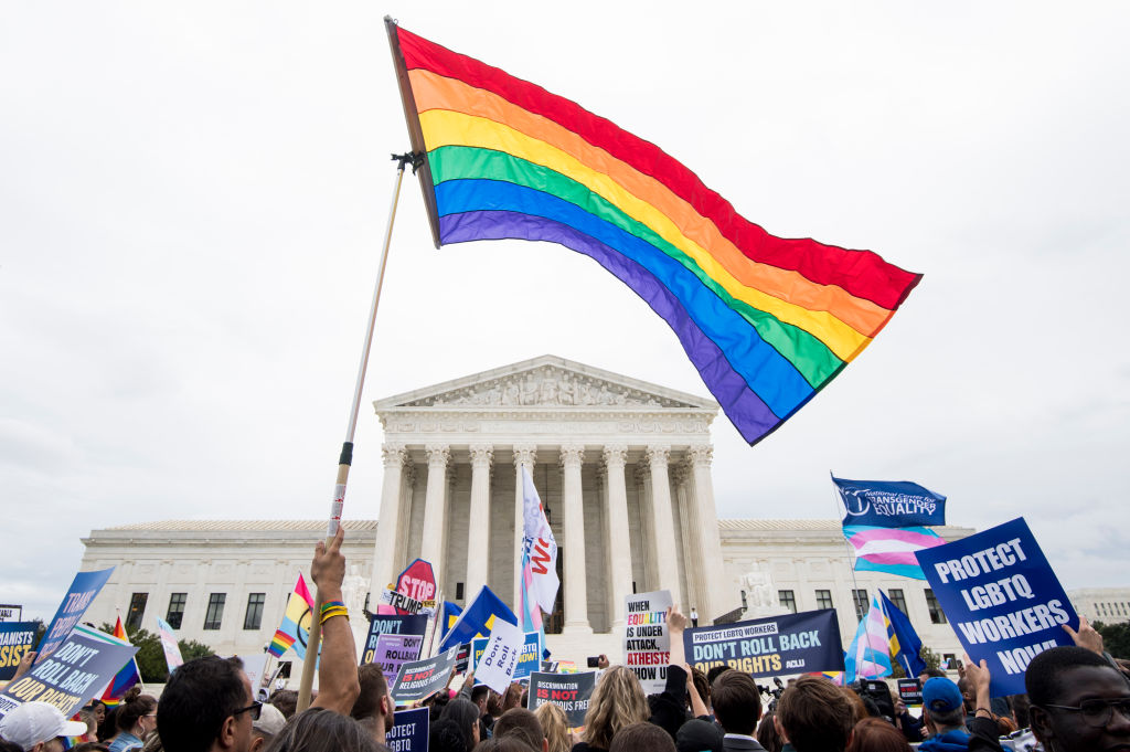 Protesters rally in front of the Supreme Court 