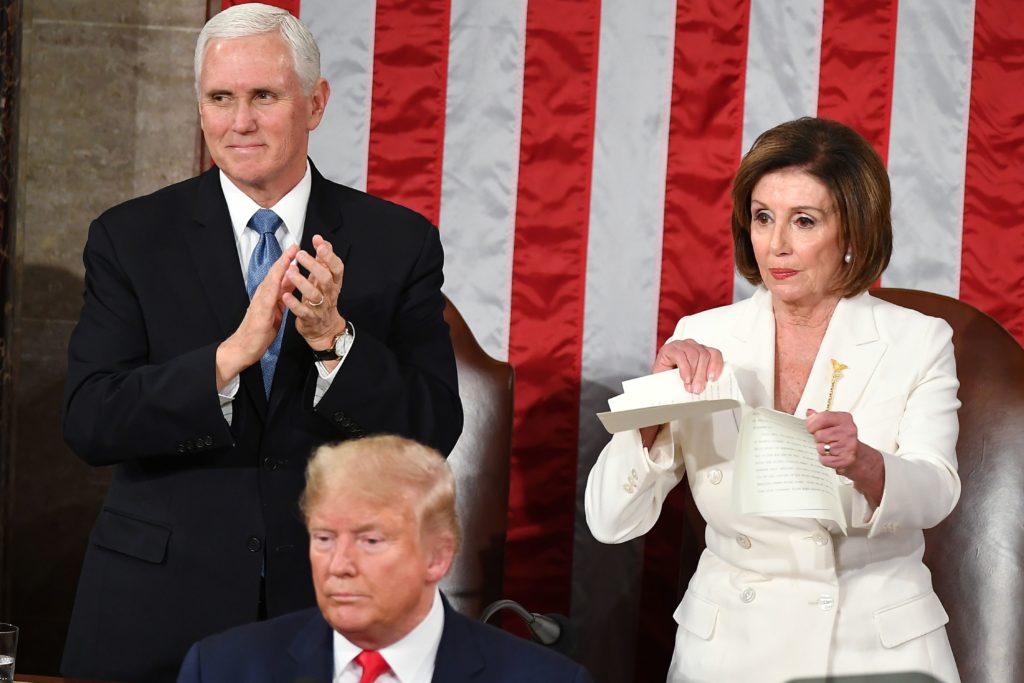 Speaker of the US House of Representatives Nancy Pelosi rips a copy of US President Donald Trumps speech after he delivered the State of the Union address at the US Capitol in Washington, DC. (MANDEL NGAN/AFP via Getty Images)