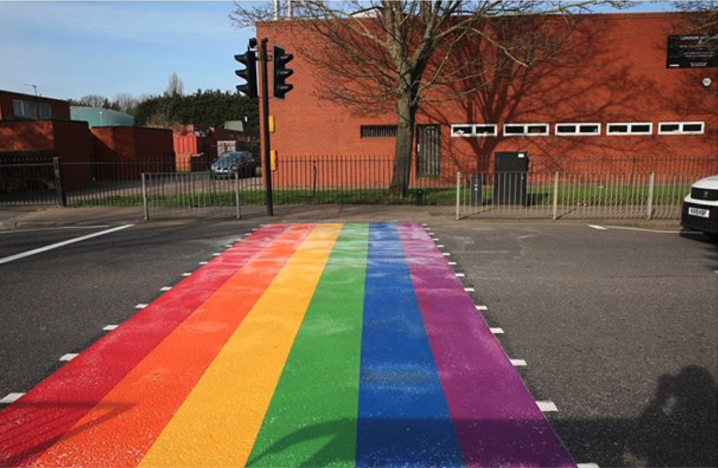 The LGBT+ Pride flag crossing outside Woodside High School attracted hundreds of online complaints. (Woodside High School/Instagram)