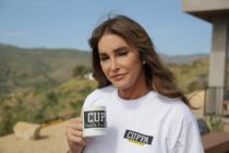 Caitlyn Jenner holding a CUPPA mug
