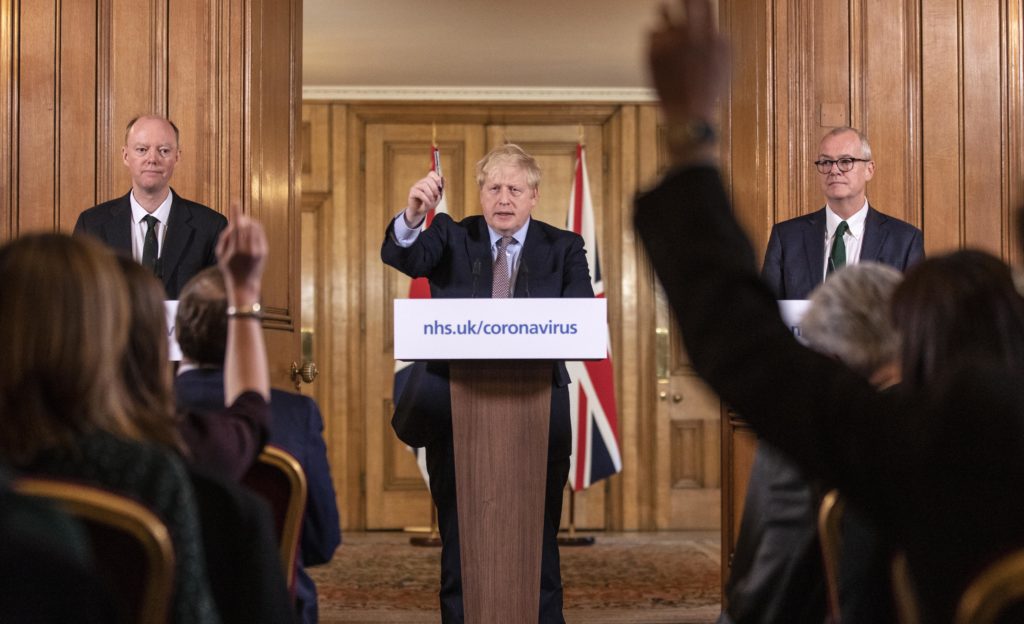 British premier Boris Johnson slapped tougher measures to contain the coronavirus, but shied away from shutting down businesses. (Richard Pohle - WPA Pool/Getty Images)