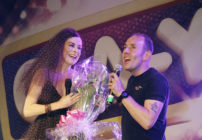 Lisa Stansfield presented with flowers by Jeremy Joseph on stage at G-A-Y Heaven on May 3, 2014 in London, England. (Jo Hale/Redferns via Getty Images)