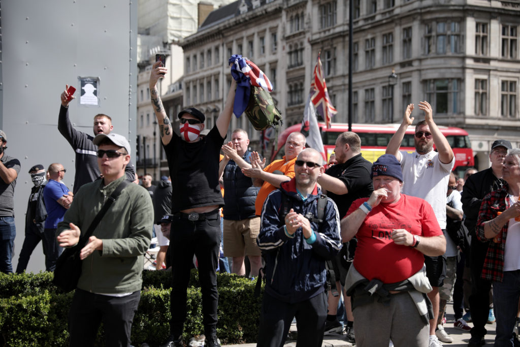 A group gathers around the Winston Churchill statue on Parliament Square on June 13, 2020. (Dan Kitwood/Getty Images)