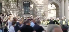 Startling video showed a gang of far-right white-supremacists flashing Nazi salutes during a riot to defend a statue of Winston Churchill, who famously defeated the Nazis. (Screen capture via Twitter)