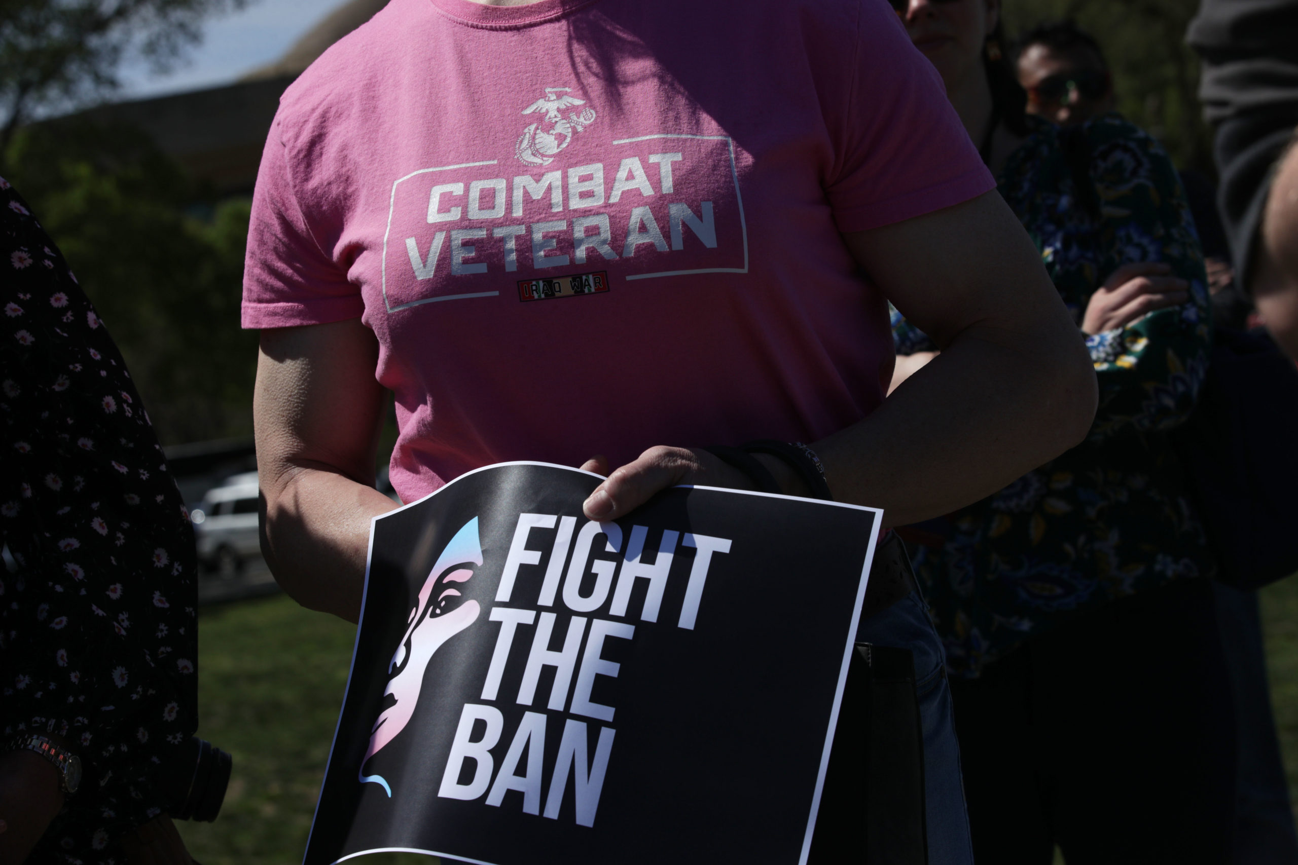 Democratic lawmakers joined activists to rally against the transgender military service ban. 