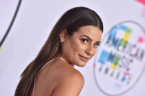 Lea Michele looks over her shoulder as she poses for a photograph