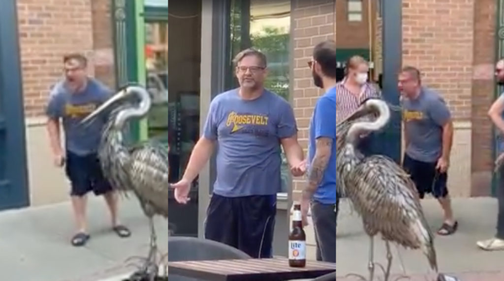 Startling video shows a white man's face redden with rage against braggers, hurling homophobic and racist insults at them. Police said it was his 'freedom of speech' to act in this way. (Screen captures via Facebook)
