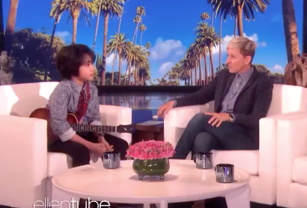 Feng E (L) speaks to Ellen DeGeneres (C). (Screen capture via Twitter)