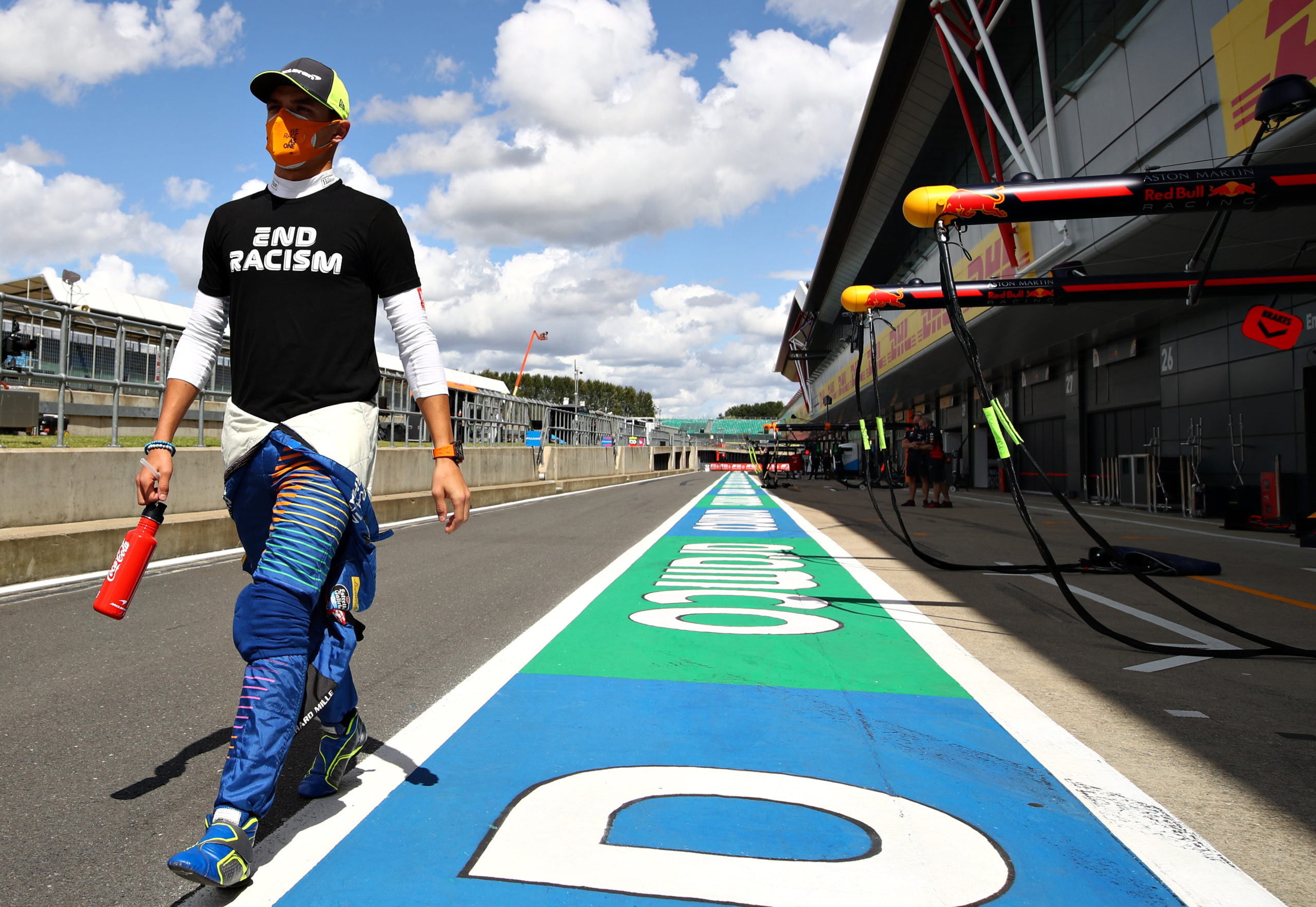  Lando Norris of Great Britain and McLaren F1 walks to the grid before the F1 Grand Prix of Great Britain at Silverstone on August 2
