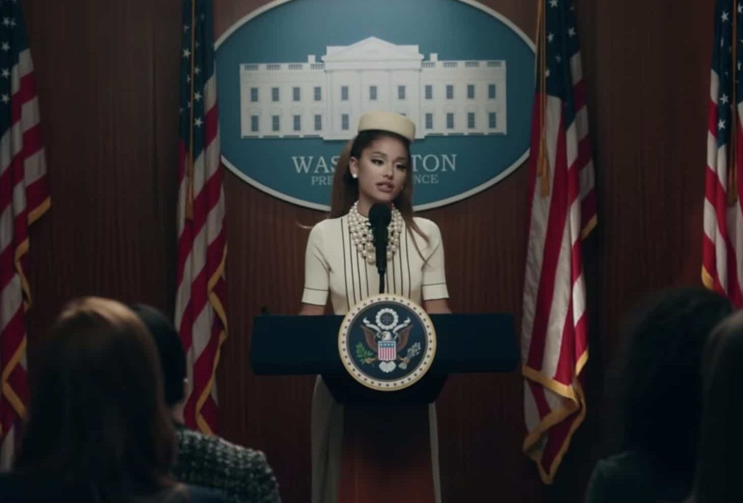 Ariana Grande juggled being US President and home life in the music video for her new song, 'Positions'. (Screen capture via YouTube)