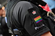 A Met police officer wearing rainbow epaulettes at Pride in London