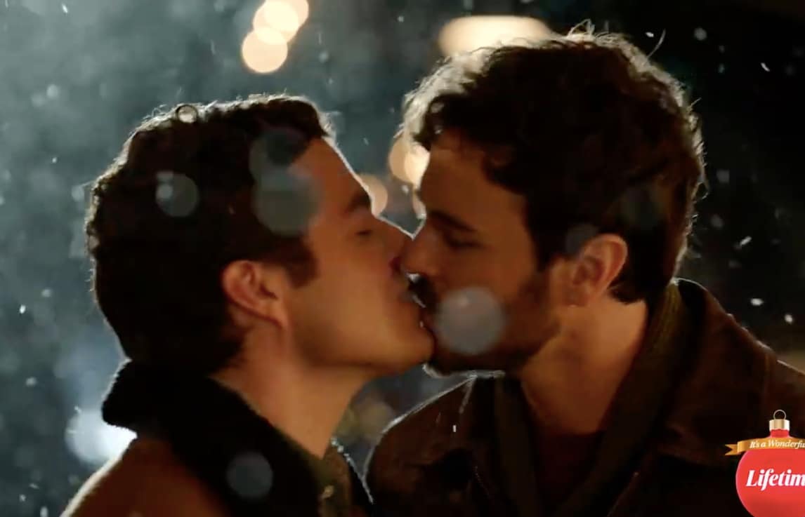 Ben Lewis and Blake Lee kiss in The Christmas Setup on Lifetime