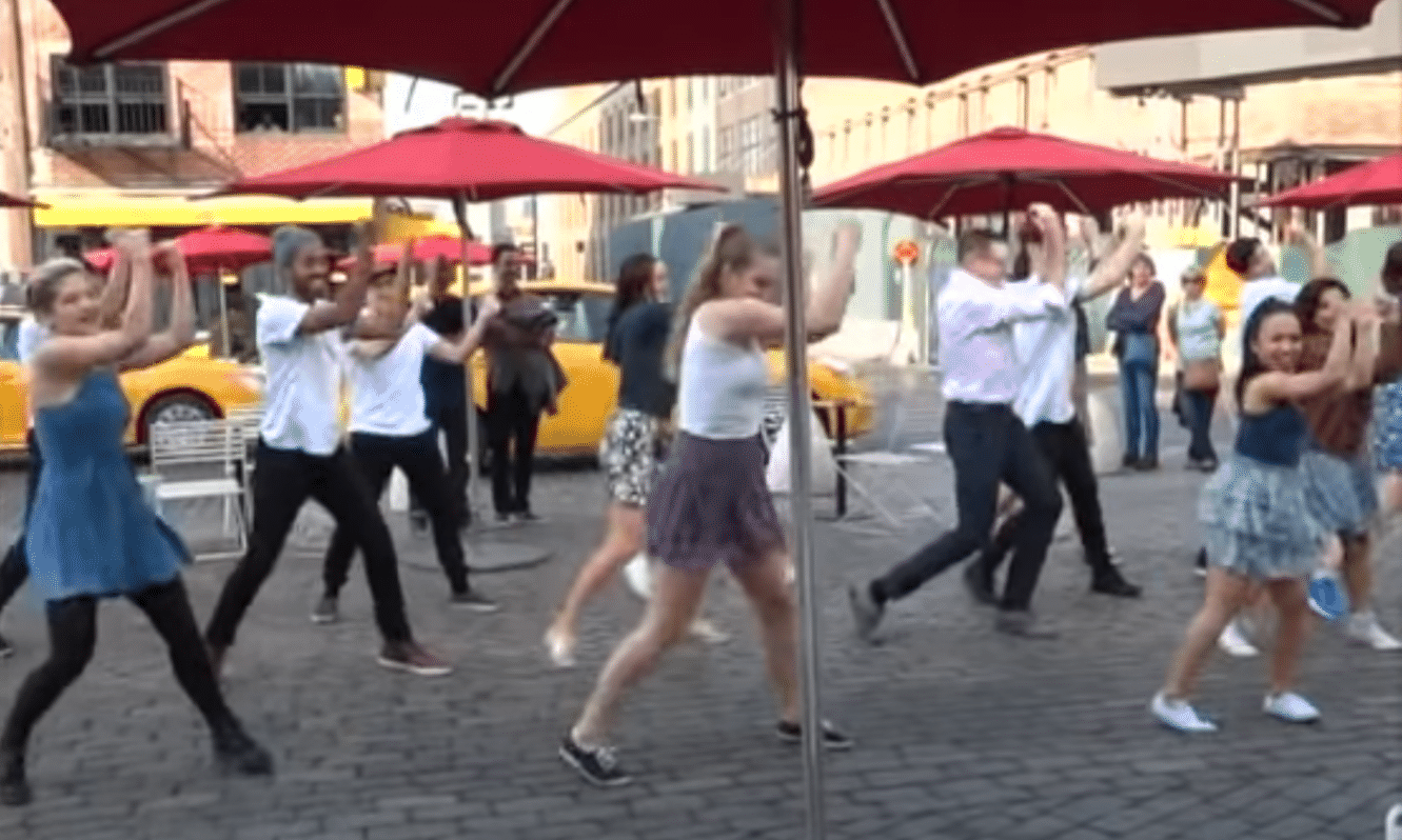 Mark in a flash mob proposal to Yuval